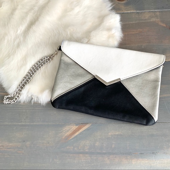 Express Handbags - Express Black White Silver Faux Leather Clutch